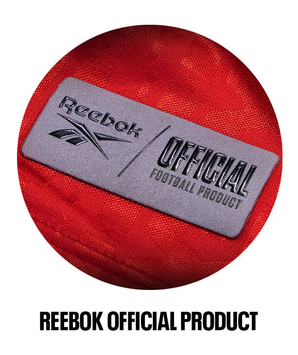 Close-up etiqueta del patrocinio Xolos Club Tijuana: Reebok Official Football Product