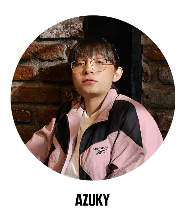 Azuky con chamarra deportiva Reebok rosa con el vector negra