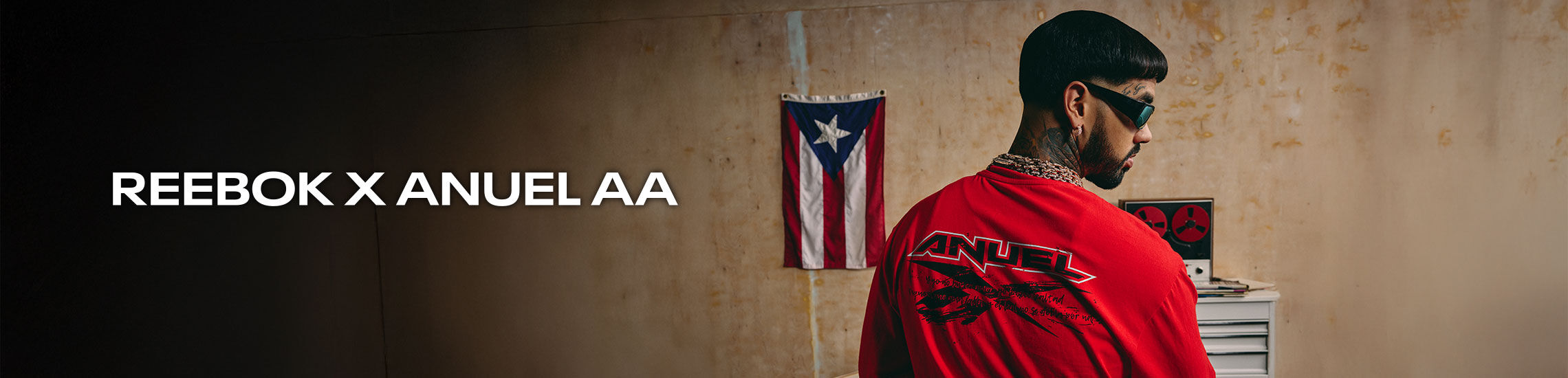 Colaboración Urbana Reebok X Anuel AA , moda streetwear con sudadera, tenis y playera